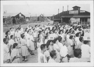[Large group standing outside in front of Mess hall 1, Rohwer, Arkansas, July 26, 1945]