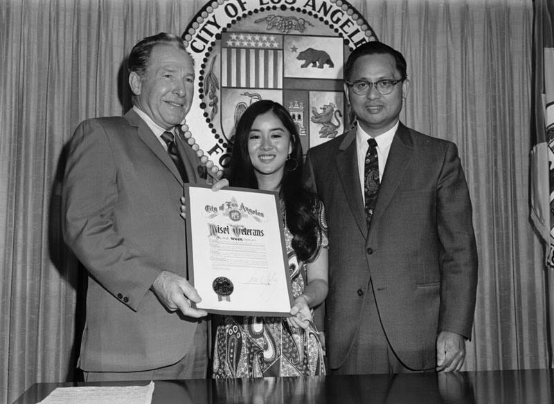 [Los Angeles Mayor Sam Yorty presenting Nisei Veterans Week proclamation at Los Angeles City Hall, Los Angeles, California, June 25, 1970]