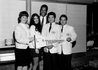 [Japanese roller derby skaters of Los Angeles Thunderbirds at Kawafuku restaurant, Los Angeles, California, July 16, 1970]