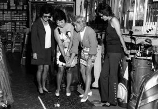 [Barbara Romack and three women golfers at L.A. Sporting Goods, Los Angeles, California, September 30, 1970]