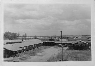 [Compound with two Red Cross trucks, Rohwer, Arkansas, 1942-1945]