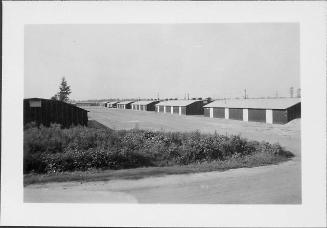 [Barracks along dirt road, Rohwer, Arkansas, August 19, 1944]