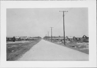 [Dirt road through camp, Rohwer, Arkansas, August 19, 1944]