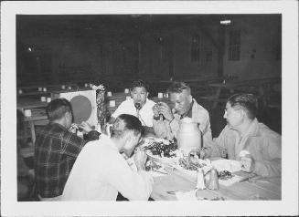 [Five men eating in mess hall, Rohwer, Arkansas, 1942-1945]