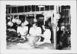 [Three women preparing food in mess hall kitchen, Rohwer, Arkansas, 1942-1945]