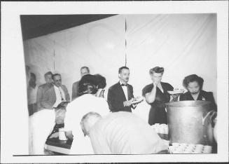 [Caucasian men and women getting food at mess hall, Rohwer, Arkansas, June 2, 1945]