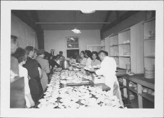 [Mess hall staff serving Caucasian people at mess hall, Rohwer, Arkansas, 1942-1945]