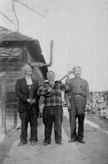 [Matasuke Toyama, Sentaro Ginoza, and Sentaro Toyama singing and playing sanshin, 1939]