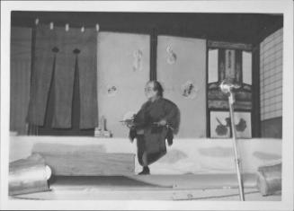 [Man smoking pipe in Kabuki play, Rohwer, Arkansas, October 21, 1944]