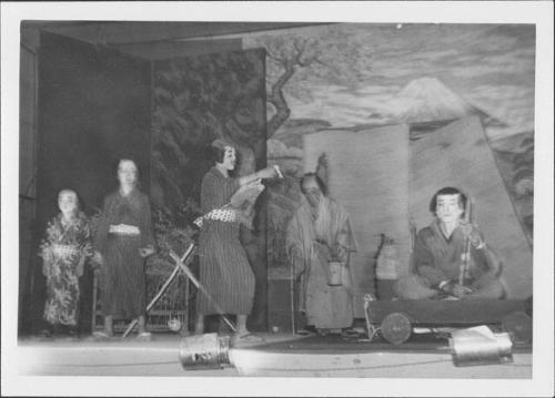 [Man talks to man on boat in Kabuki play, Rohwer, Arkansas]