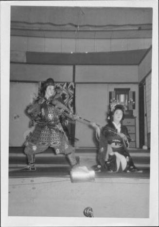 [Warrior and princess grasping bow in Kabuki play, Rohwer, Arkansas, November 11, 1944]
