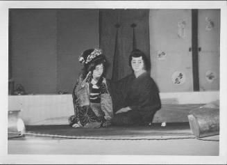 [Seated couple in Kabuki play, Rohwer, Arkansas, October 21, 1944]