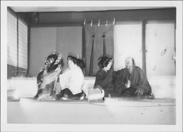 [Young man and woman each being counseled by a woman and an old man in Kabuki play, Rohwer, Arkansas, October 21, 1944]
