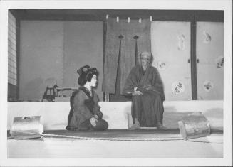 [Woman and old man talking in Kabuki play, Rohwer, Arkansas, October 21, 1944]